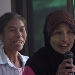 Visage de femme présentes à un séminaire sur les violences domestiques en Thaïlande.